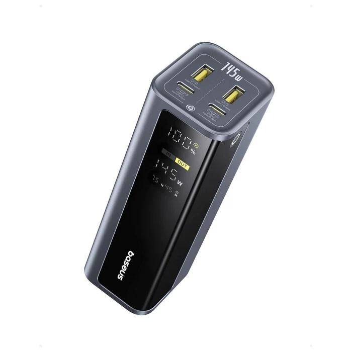 Baseus EnerGeek GP12 145W portable charger in grey standing upright next to its USB-C cable