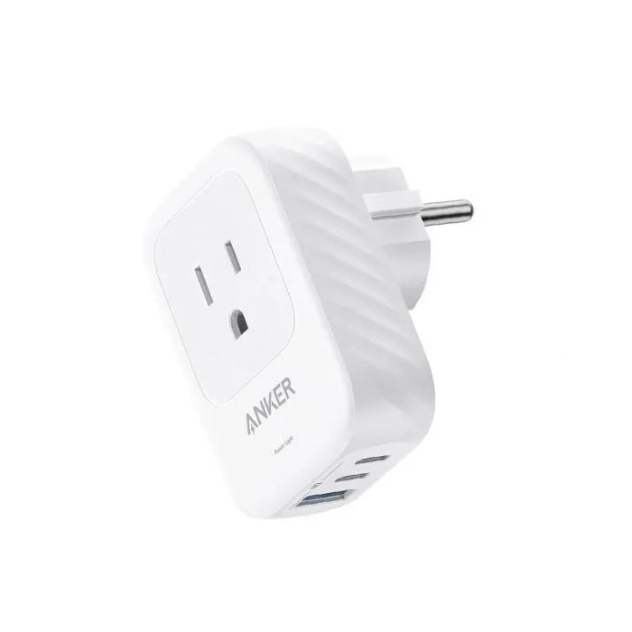Side angle view of white Anker travel adapter charger showing USB charging ports and rear EU plug