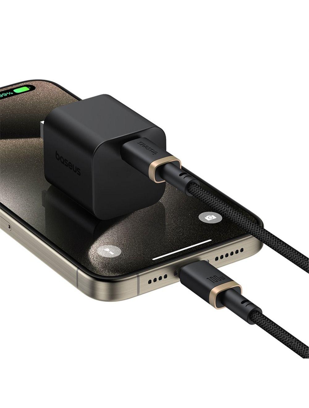Baseus Dura 100W USB-C cable charging a smartphone connected to a fast wall charger