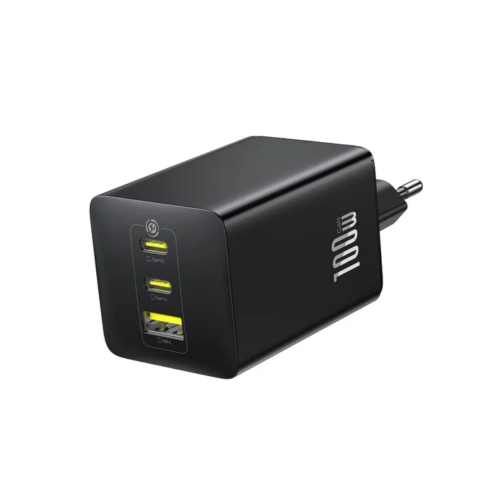 Front angled view of Baseus EnerFill FE11 100W GaN fast charger in black showing two Type-C ports, one USB-A port, and EU plug.