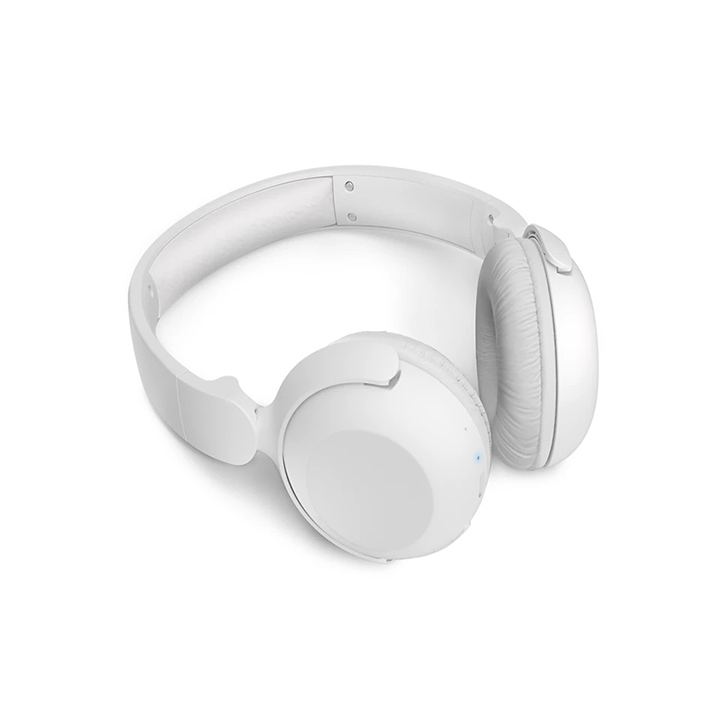 Top angled view of the folded white Philips wireless headphones showcasing the compact, travel-friendly design.